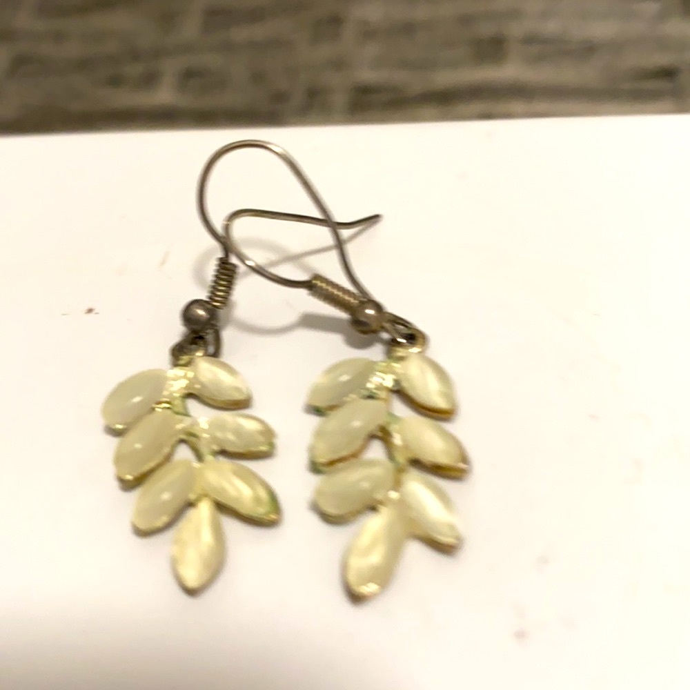 Mother of pearl hanging earrings reminiscent of snow covered foliage